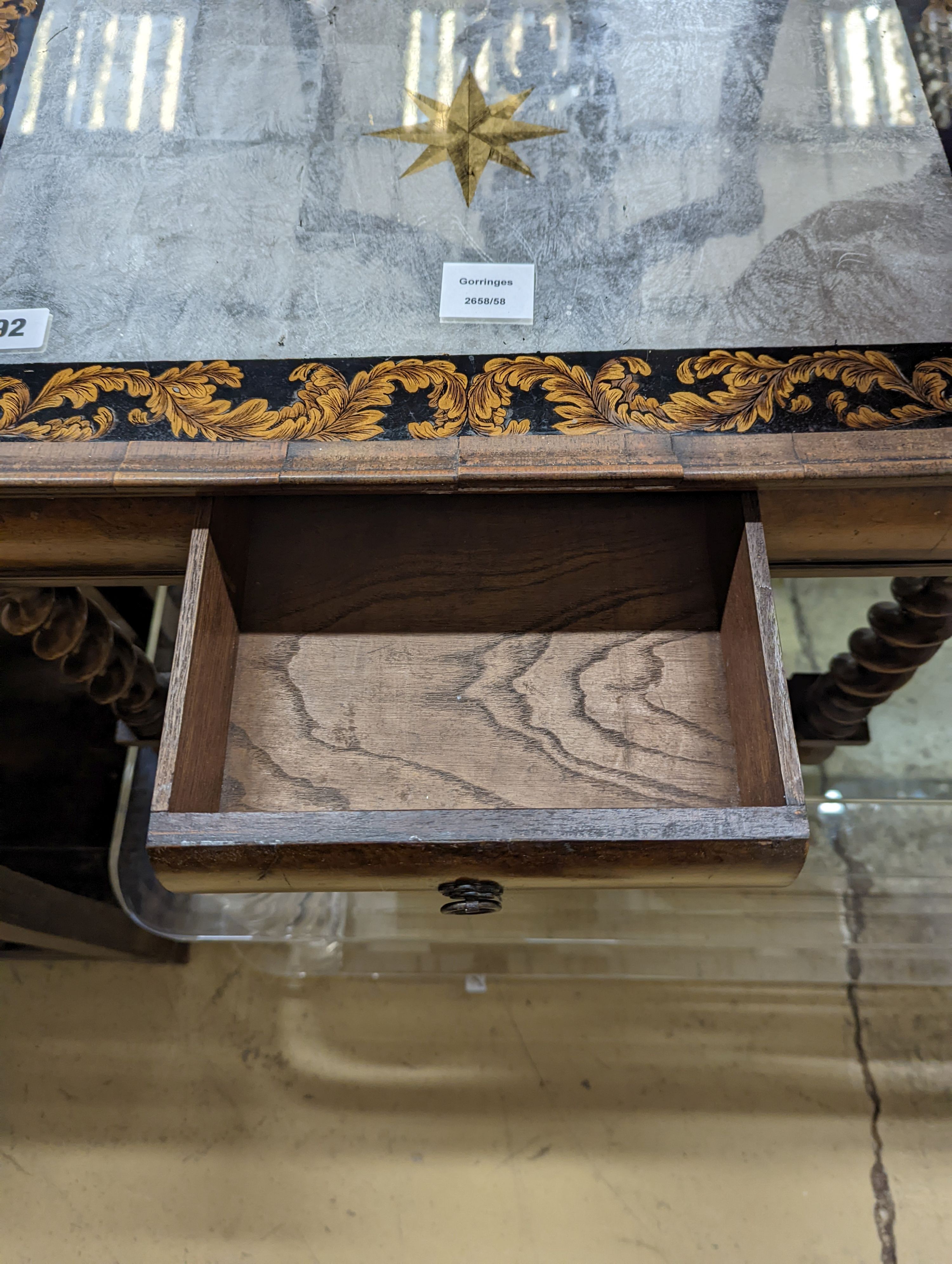 A walnut side table with mirrored top, (altered) width 59cm, depth 42cm, height 43cm